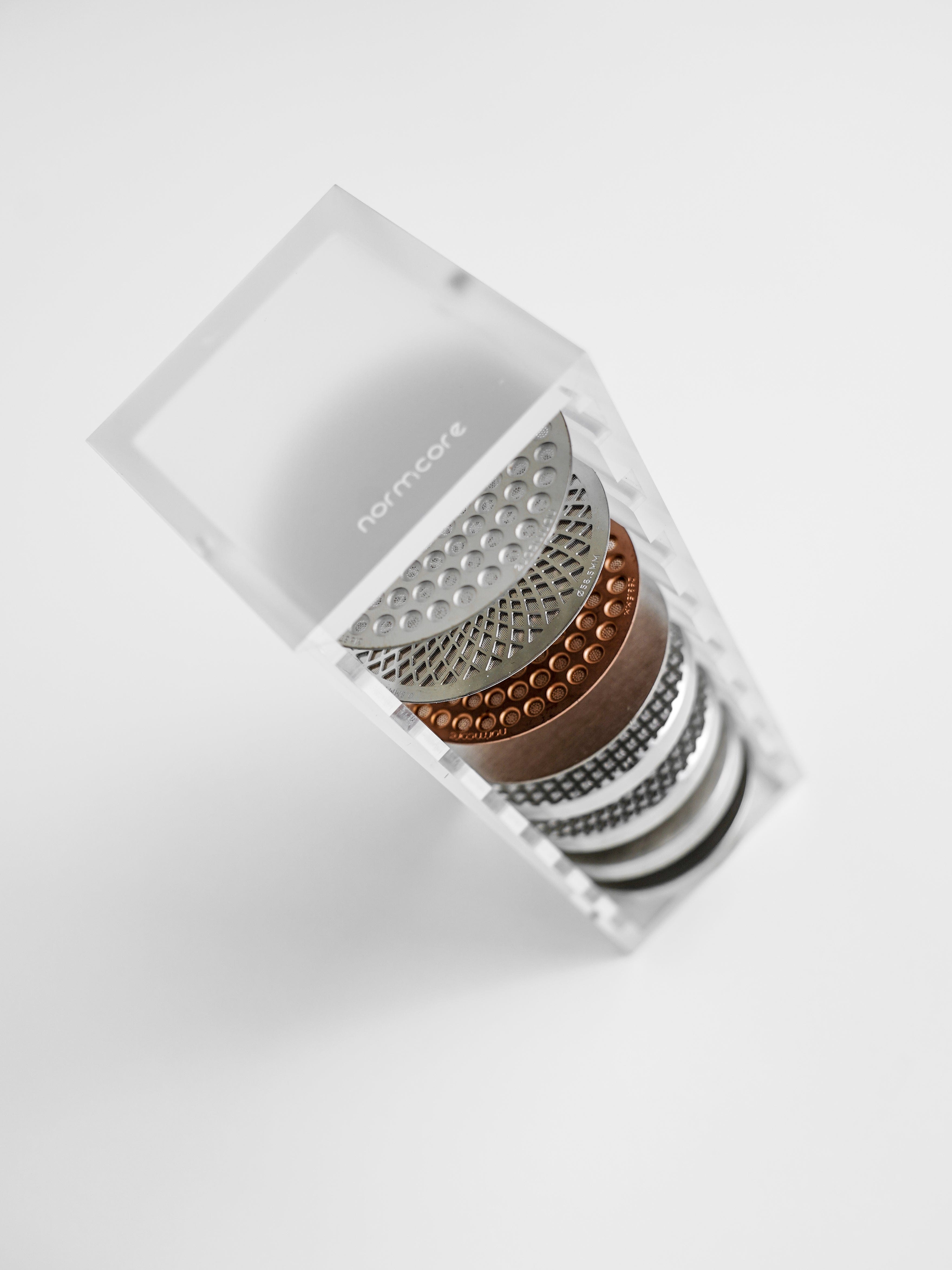 Normcore / DEPOSITOS DE CAFÉ EN GRANOS DE 12 TUBOS CON SOPORTE