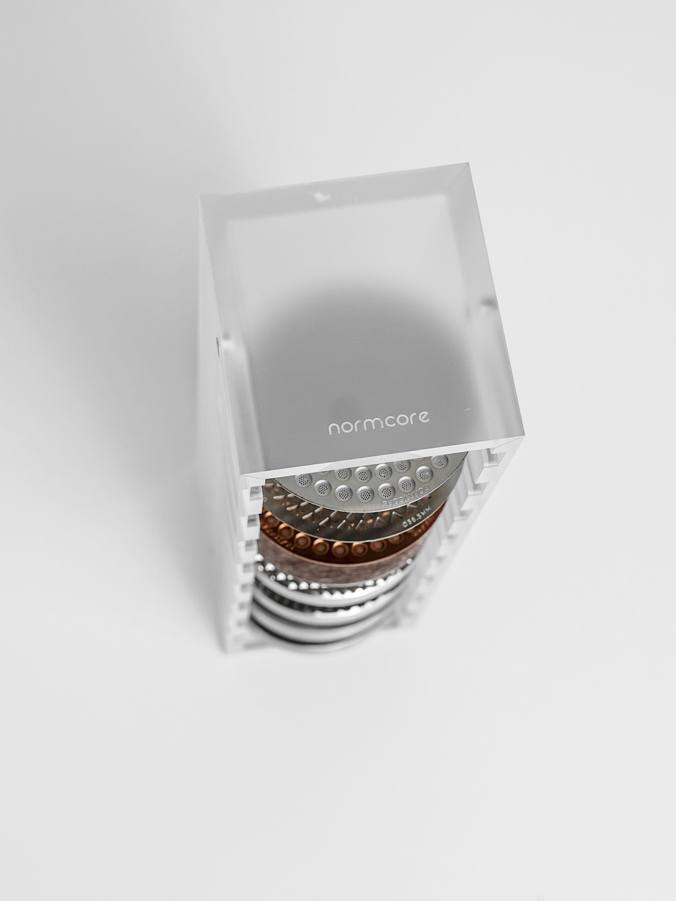 Normcore / DEPOSITOS DE CAFÉ EN GRANOS DE 12 TUBOS CON SOPORTE