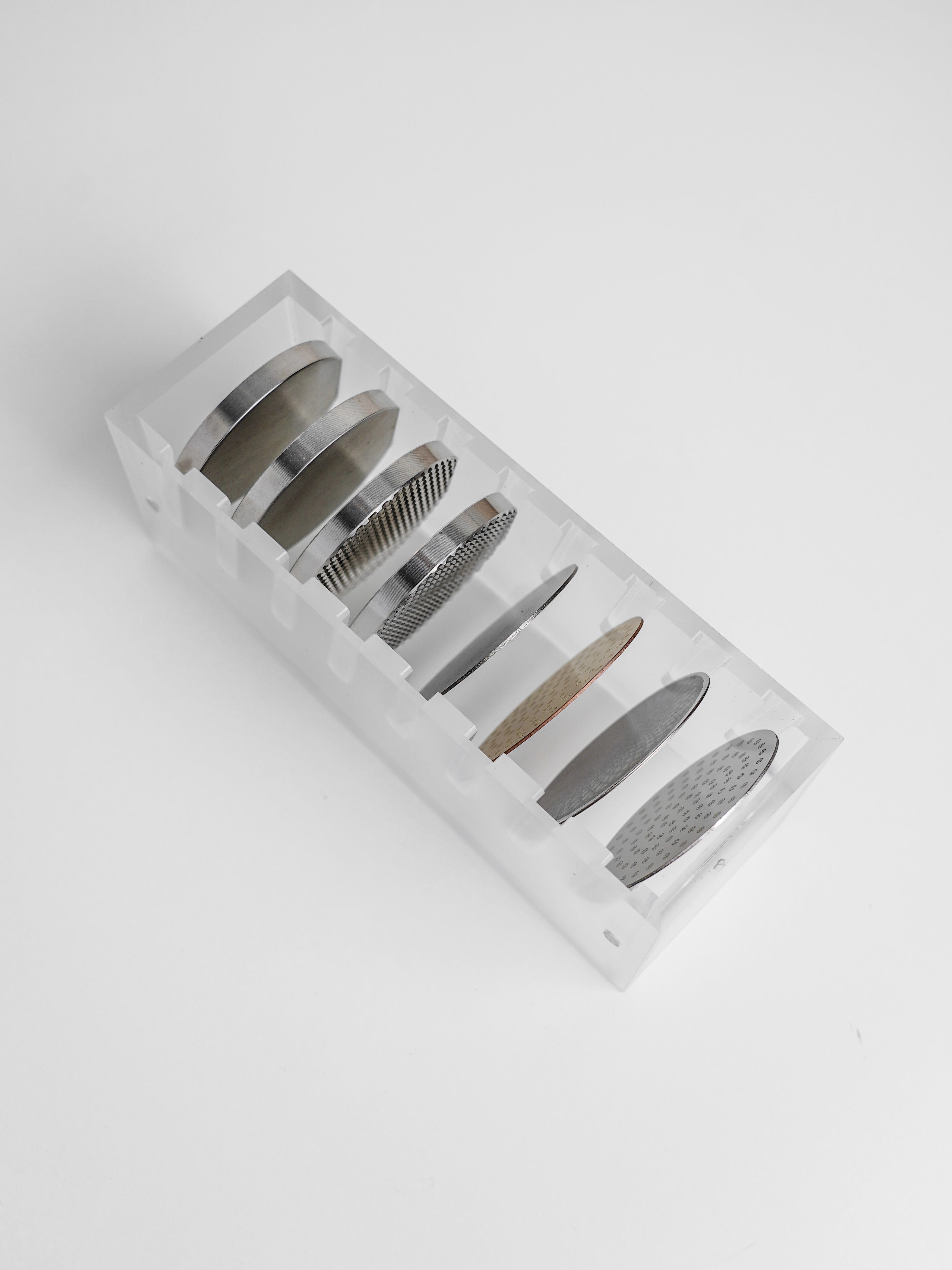 Normcore / DEPOSITOS DE CAFÉ EN GRANOS DE 12 TUBOS CON SOPORTE